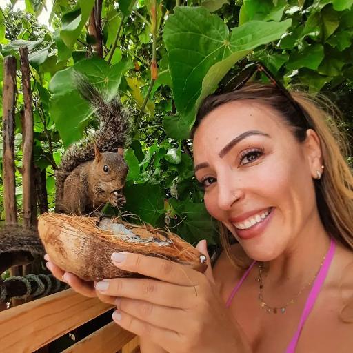 Girl Posing with a Squirrel on Santo Aleixo Island